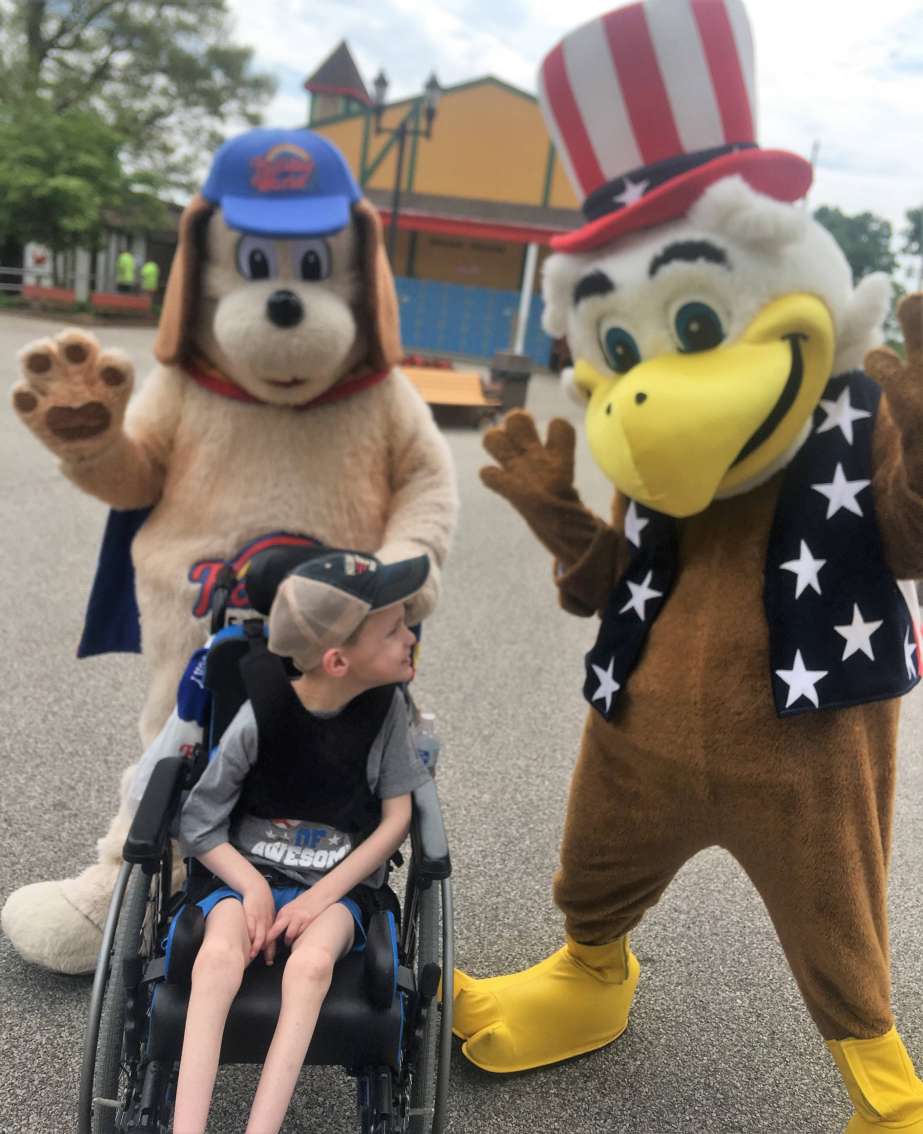 Holidog and George the Eagle with Child on Play Day